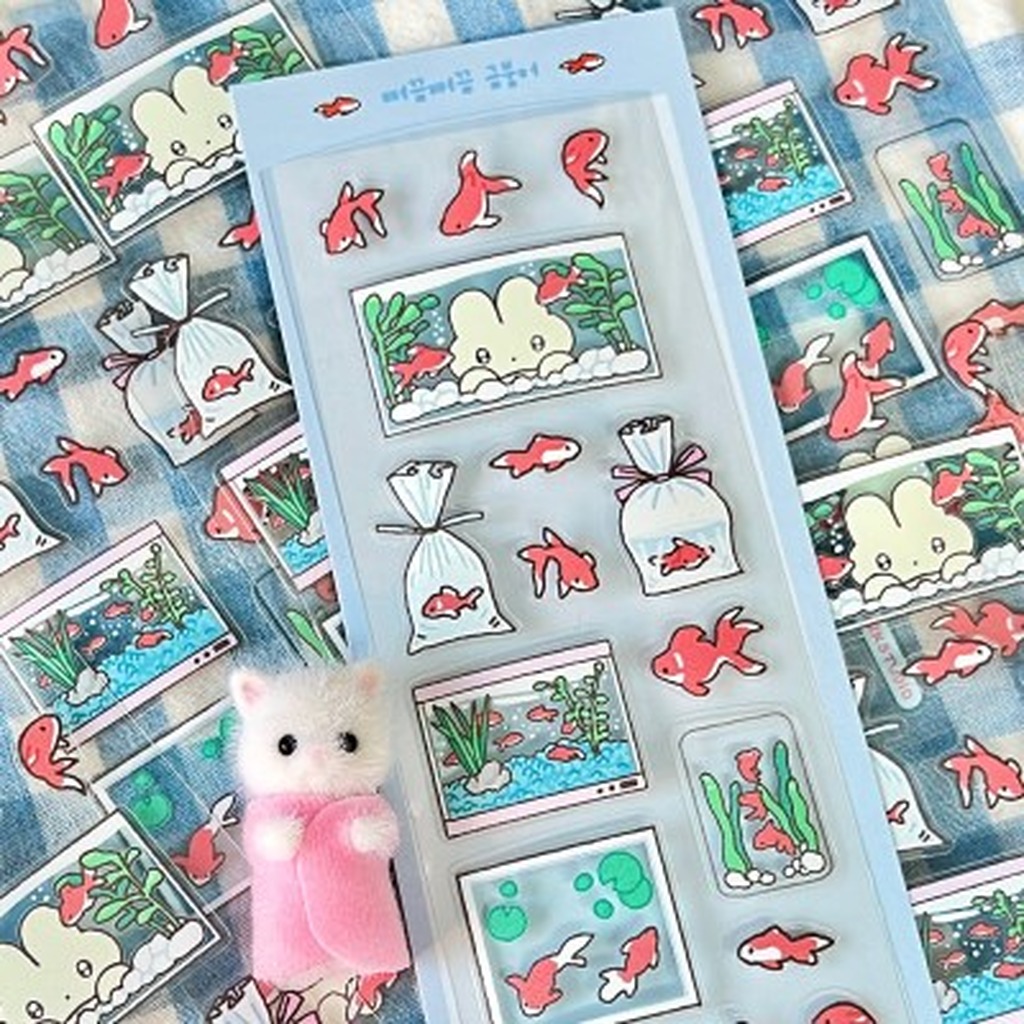 "meta_description": "Enhance your crafts with a Peeking Goldfish Transparent Sticker. Perfect for creative projects!",