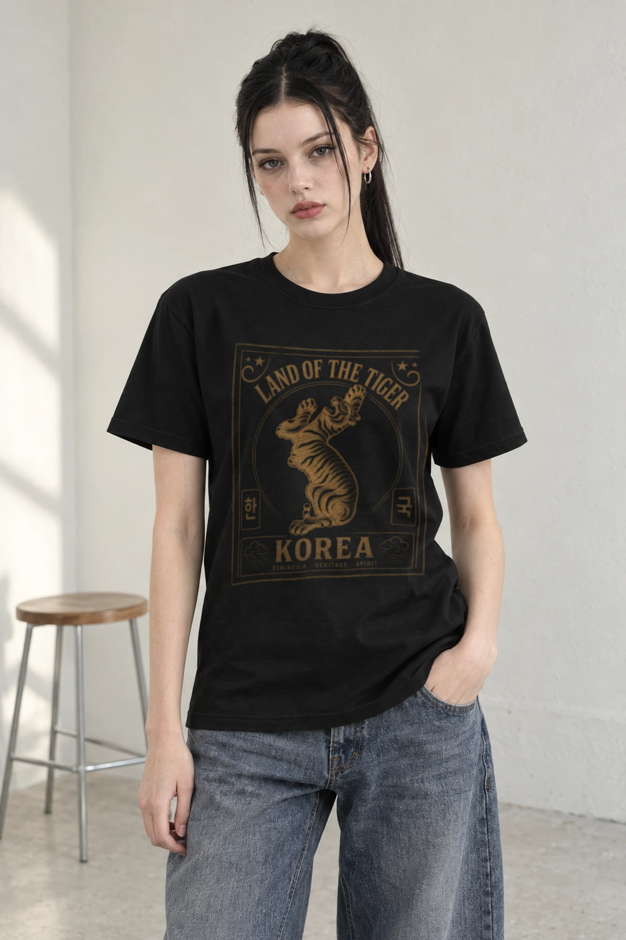 Land of Tiger tee worn by a model