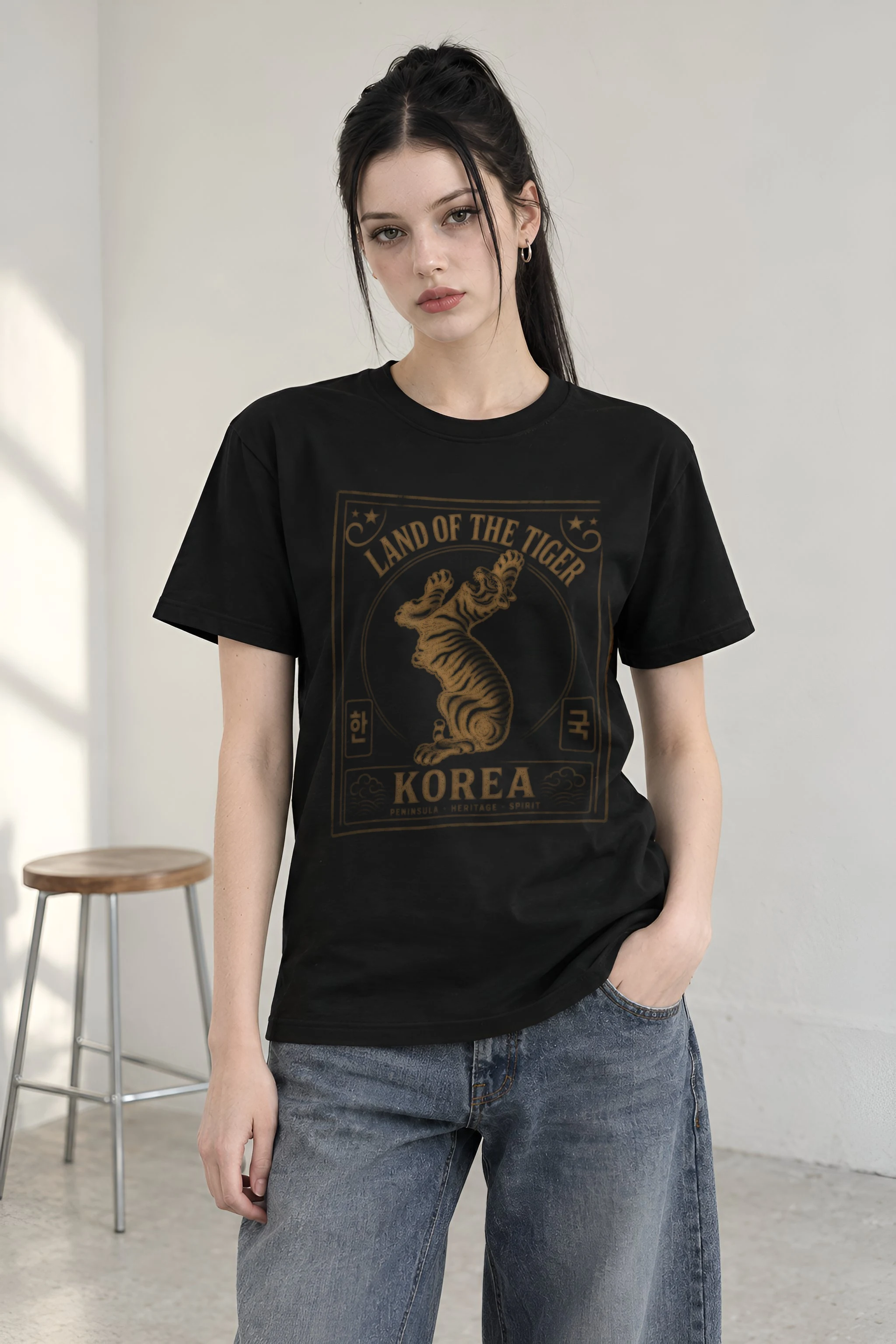 Land of Tiger tee worn by a model