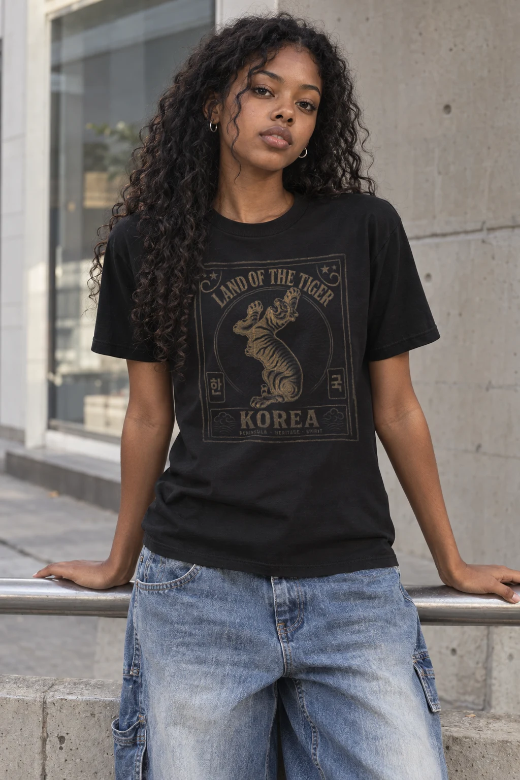 Land of Tiger tee worn by a model