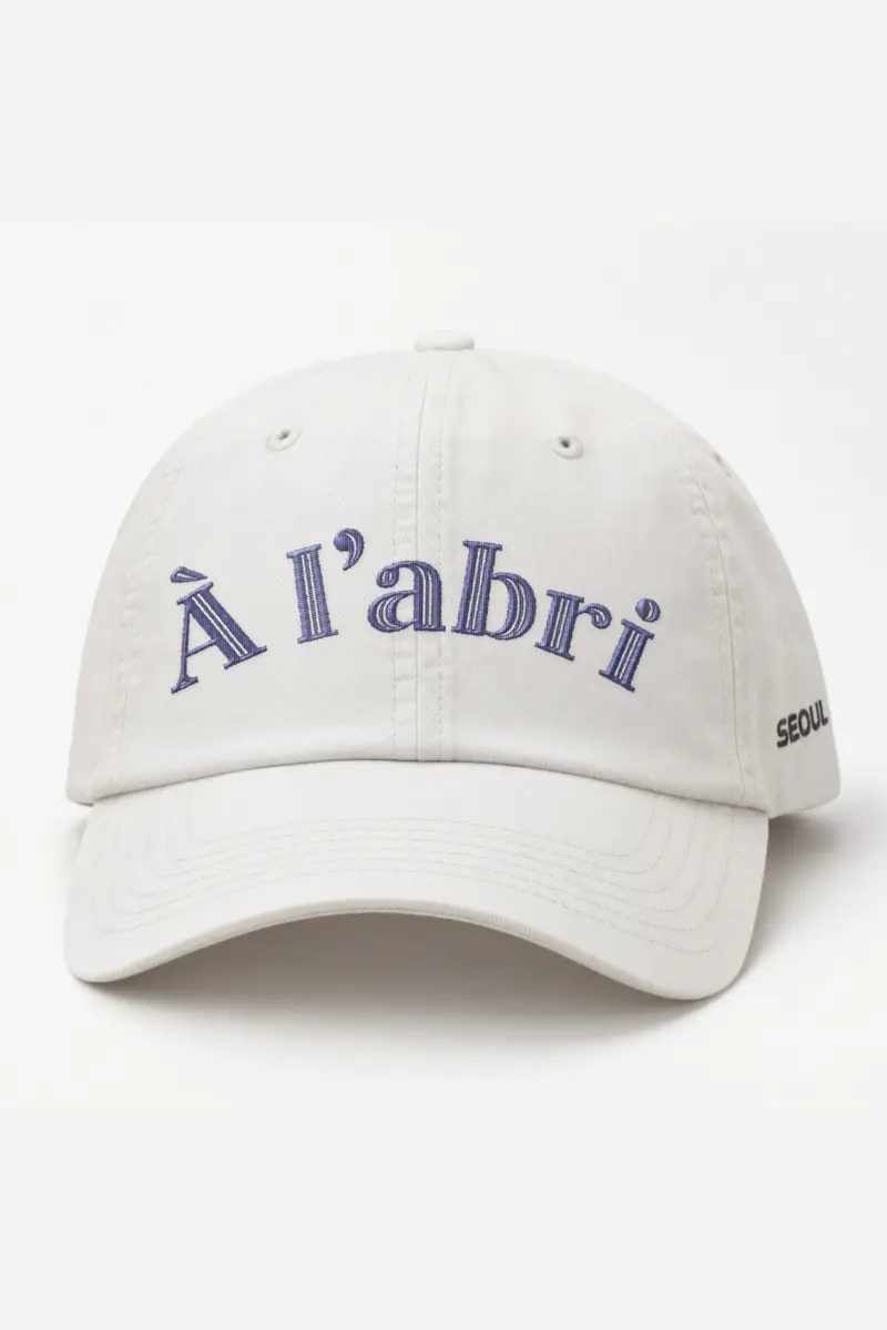 "À L’Abri" Classic Dad Hat · Embroidered — white/cap-front