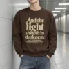 "And the Light Shineth" Heavy Blend Unisex Crewneck Sweatshirt