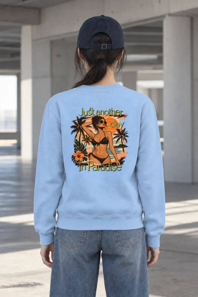 "Another Day in Paradise" Heavy Blend Unisex Crewneck Sweatshirt