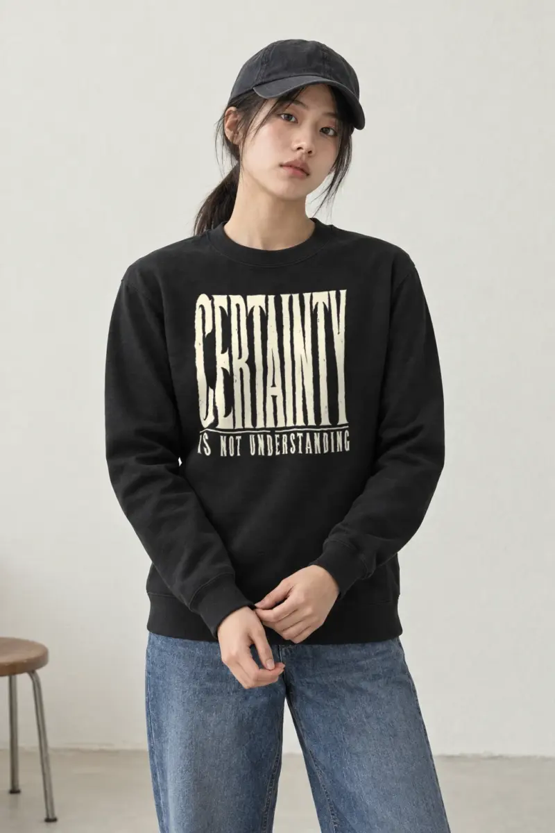 “Certainty Is Not Understanding” Heavy Blend Unisex Crewneck Sweatshirt