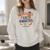 "Eat Baguettes" Heavy Blend Unisex Crewneck Sweatshirt | Gildan 18000
