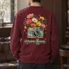"Flower-Filled Camera" Heavy Blend Unisex Crewneck Sweatshirt | Gildan 18000