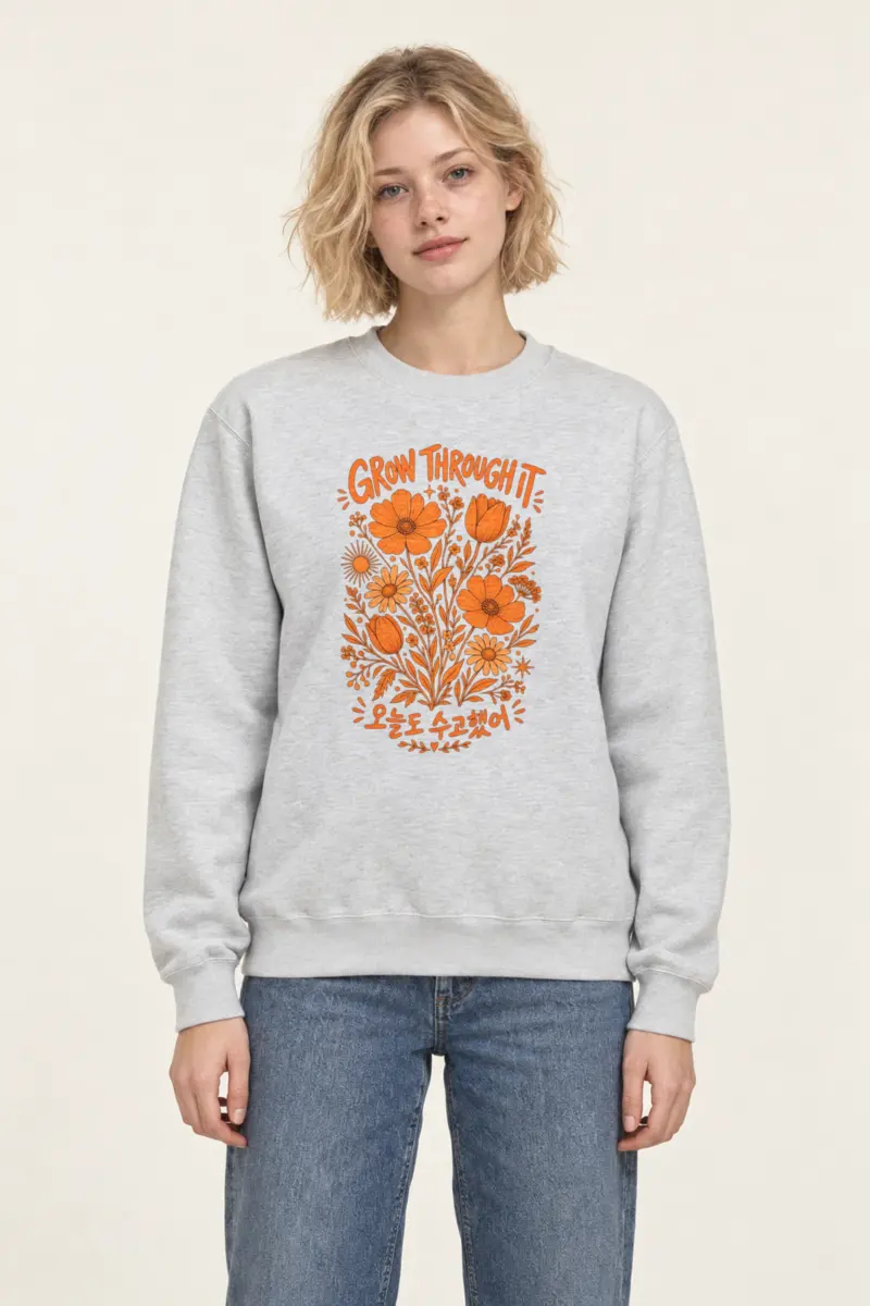 "Grow Through It" Heavy Blend Unisex Crewneck Sweatshirt