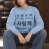 "Handling Label Typography" Heavy Blend Unisex Crewneck Sweatshirt