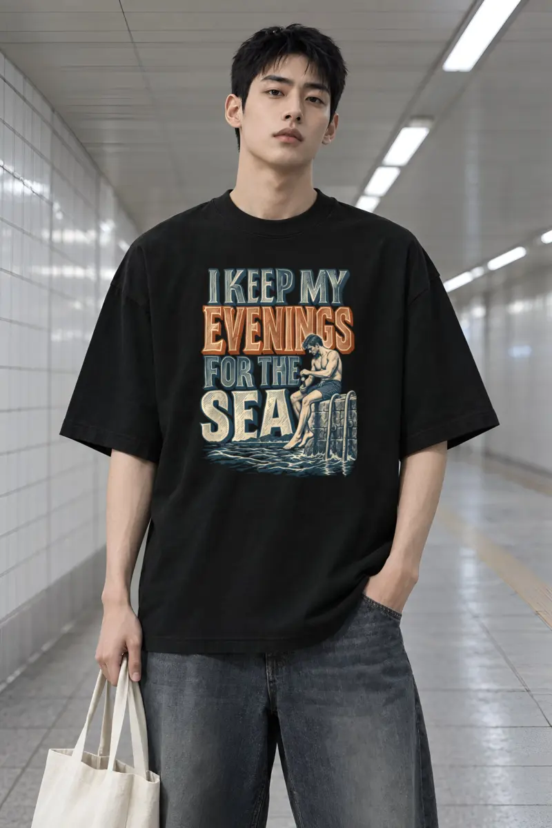 "I Keep My Evenings for the Sea" Men's Oversized Heavyweight Crewneck T-Shirt