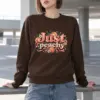 "Peach Ribbon Script" Heavy Blend Unisex Crewneck Sweatshirt