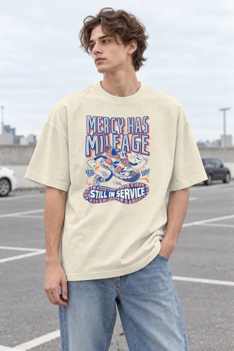 "Mercy Has Mileage" Men's Oversized Heavyweight Crewneck T-Shirt