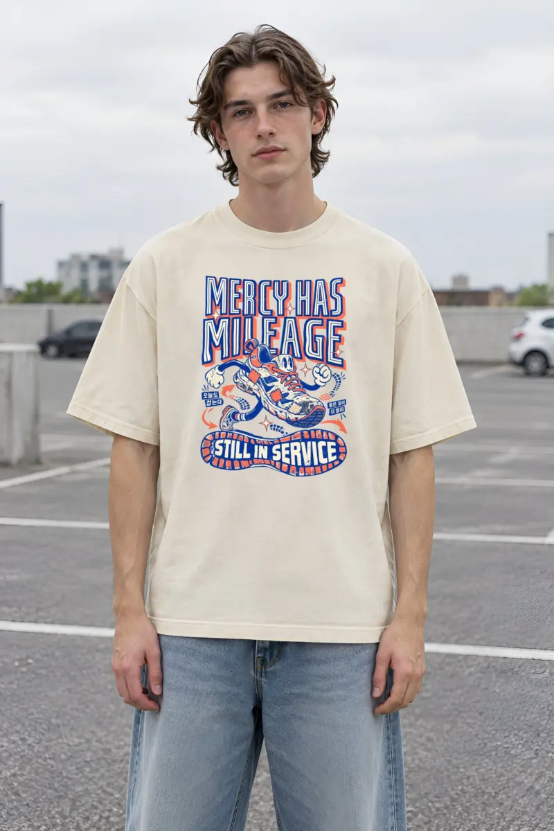 "Mercy Has Mileage" Men's Oversized Heavyweight Crewneck T-Shirt
