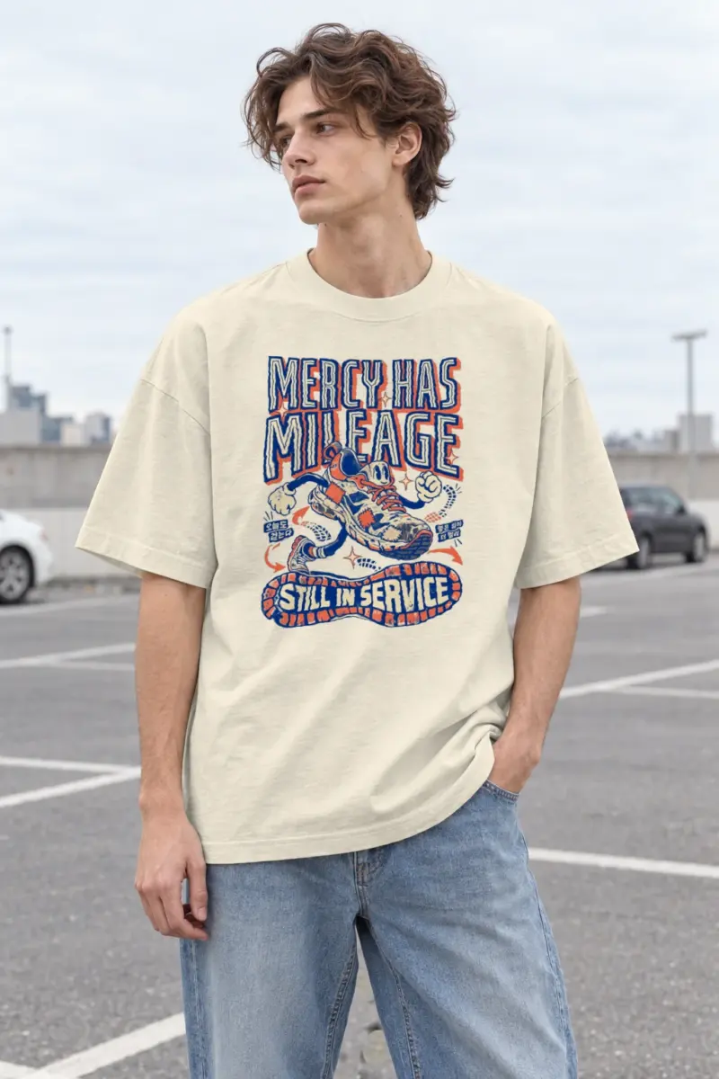 "Mercy Has Mileage" Men's Oversized Heavyweight Crewneck T-Shirt
