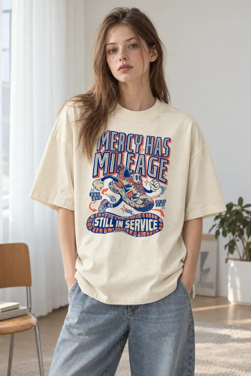 “Mercy Has Mileage” Men’s Oversized Heavyweight Crewneck T-Shirt | Shaka Wear SHMHSS
