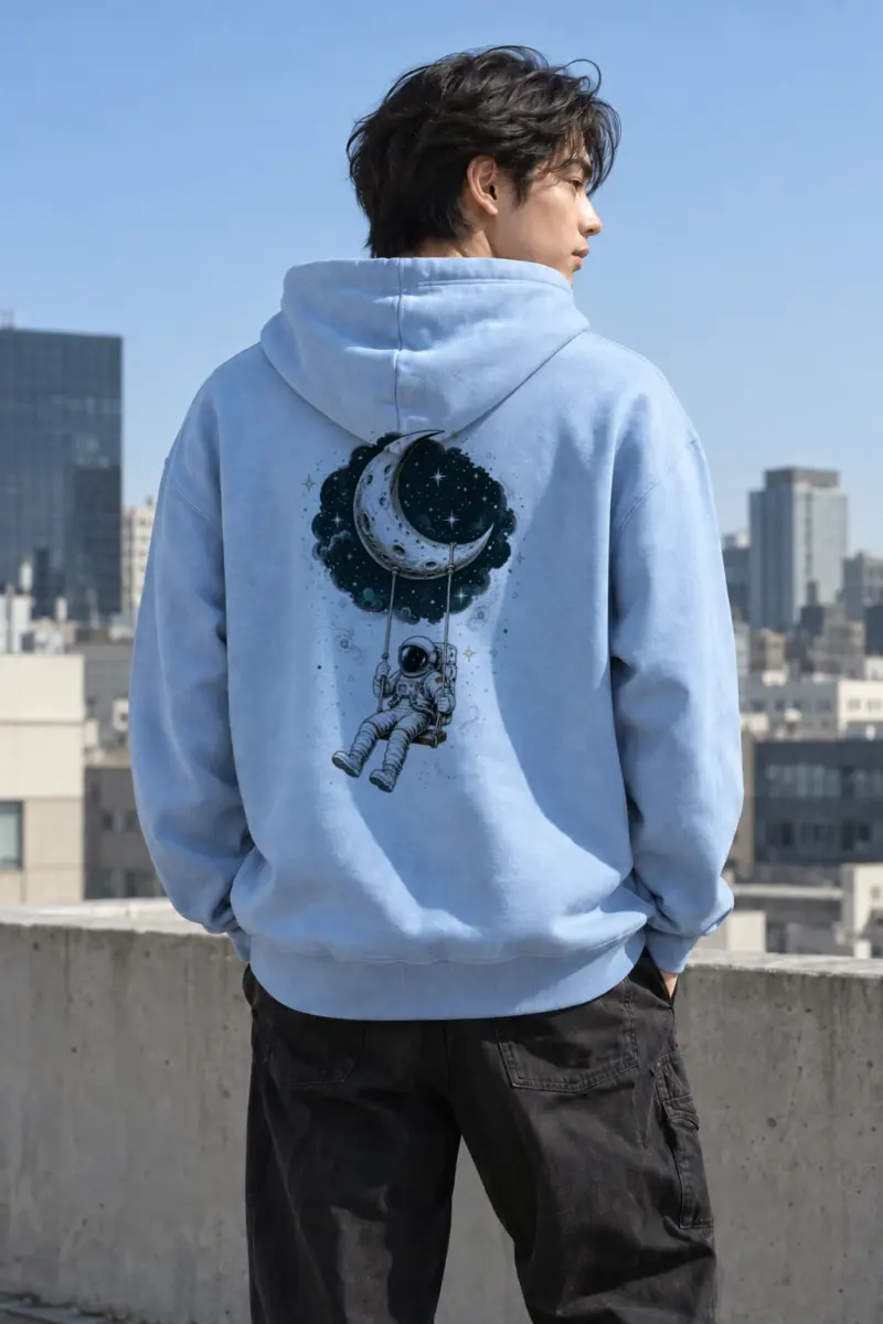 "Moon Swing Astronaut" Heavy Blend Unisex Pullover Hoodie | Gildan 18500