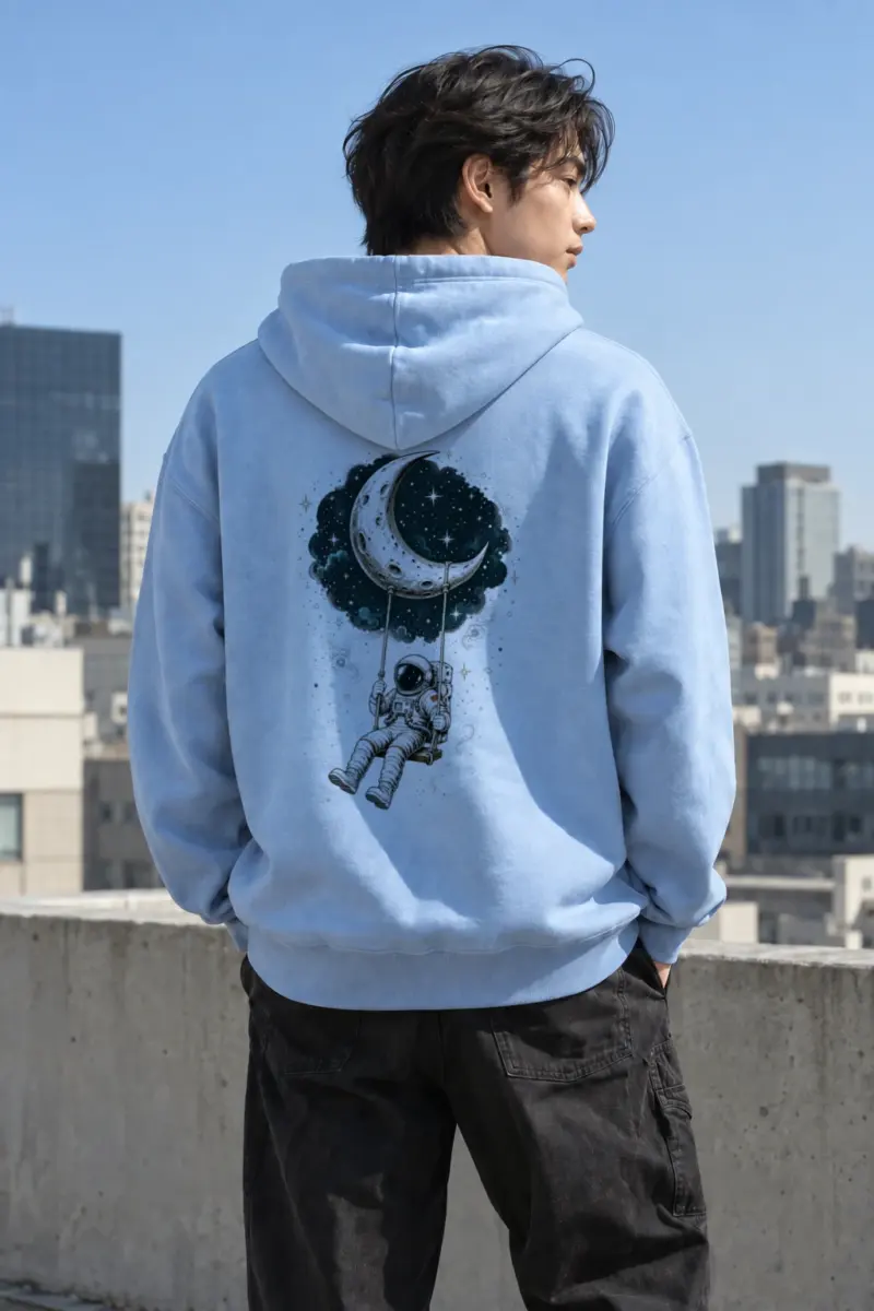 “Moon Swing Astronaut” Heavy Blend Unisex Pullover Hoodie | Gildan 18500