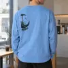 "Moon Swing Astronaut" Unisex Longsleeve T-shirt | Gildan 2400