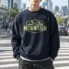 "Mountain Wilderness Badge" Heavy Blend Unisex Crewneck Sweatshirt | Gildan 18000