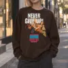 "Never Give Up" Heavy Blend Unisex Crewneck Sweatshirt | Gildan 18000