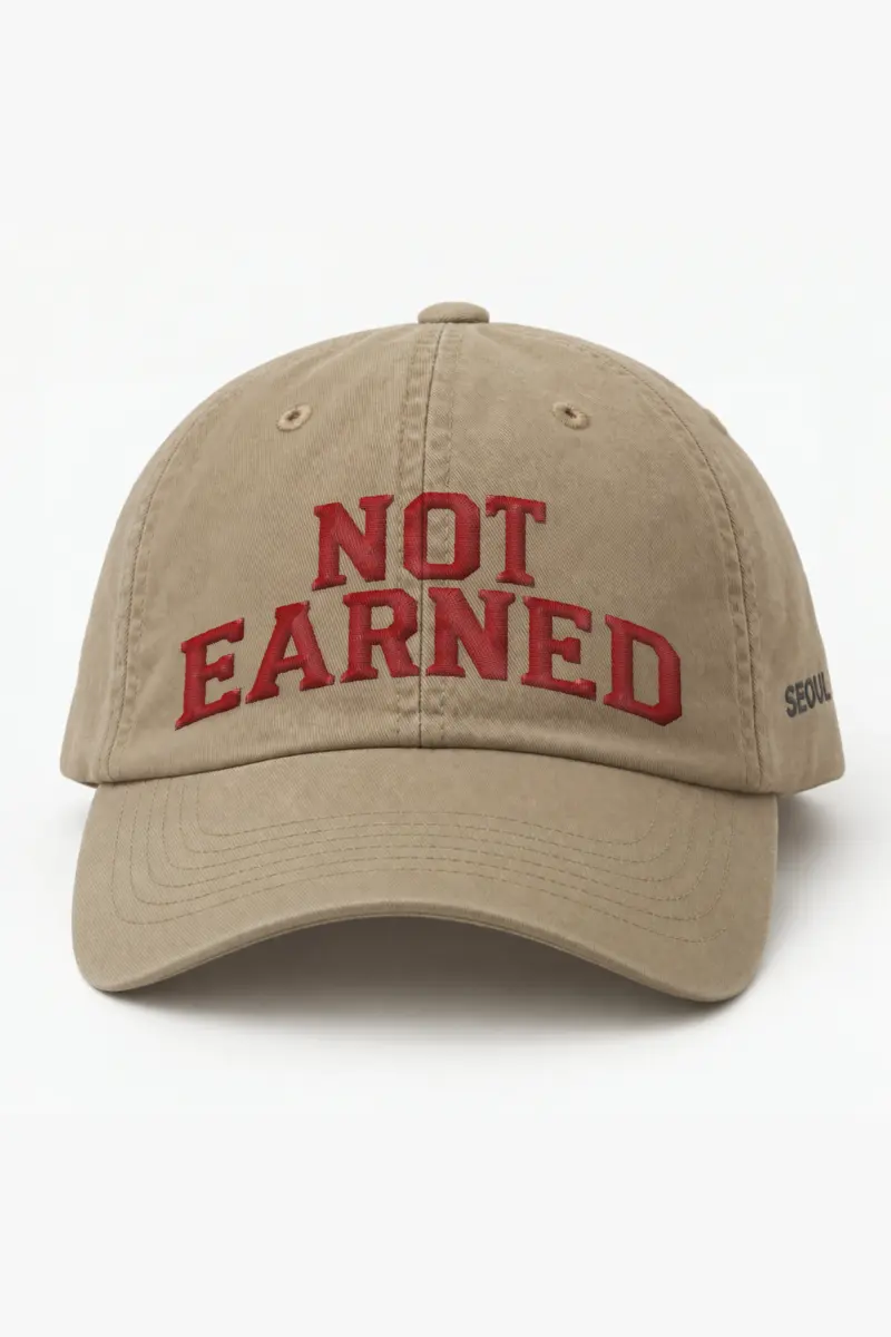 "Not Earned" Classic Dad Hat · Embroidered — khaki/cap-front