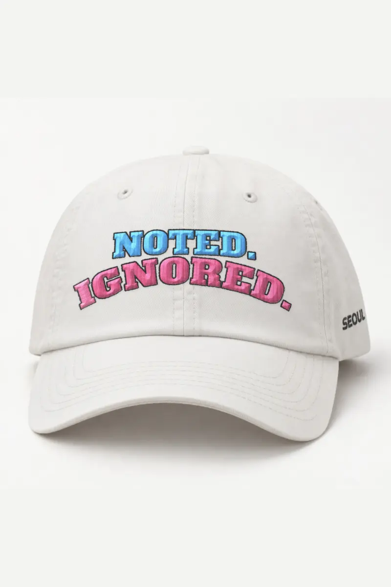 "Noted. Ignored." Classic Dad Hat · Embroidered — white/cap-front