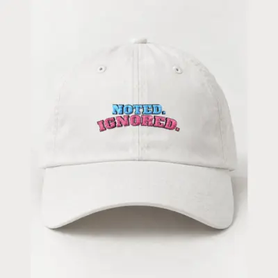 "Noted. Ignored." Classic Dad Hat · Embroidered