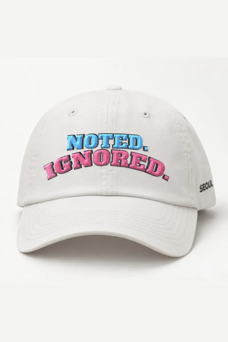 "Noted. Ignored." Classic Dad Hat · Embroidered