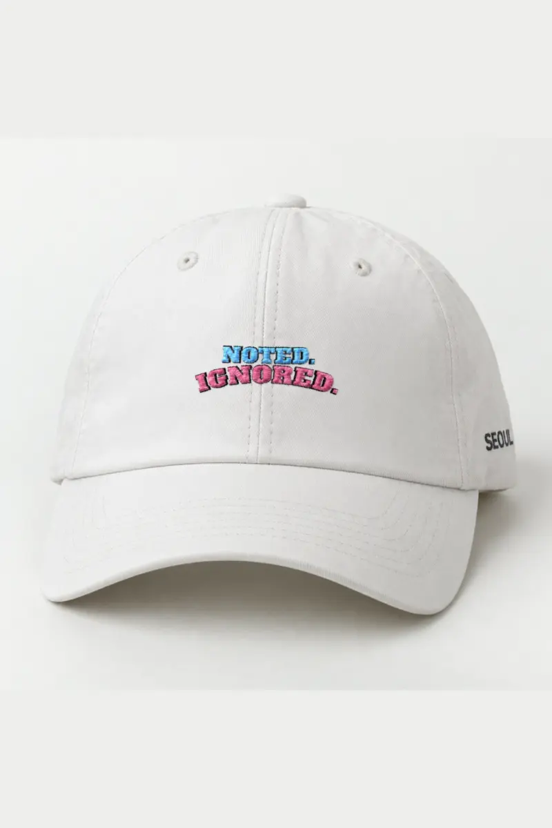 "Noted. Ignored." Classic Dad Hat · Embroidered