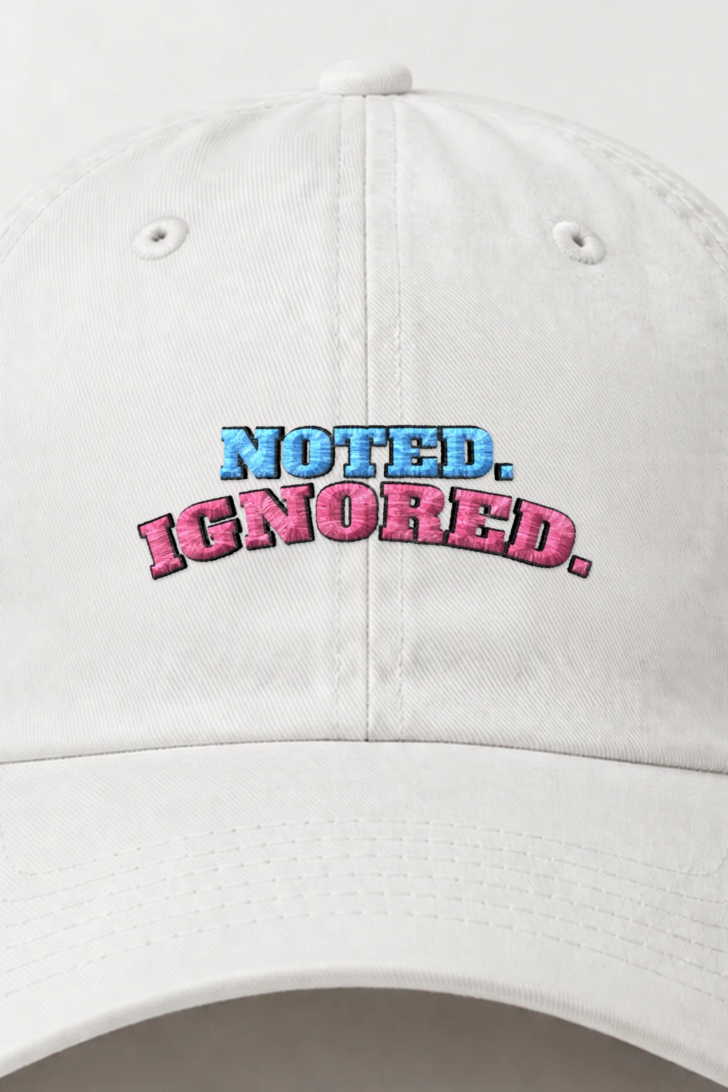 "Noted. Ignored." Classic Dad Hat · Embroidered | Yupoong 6245CM