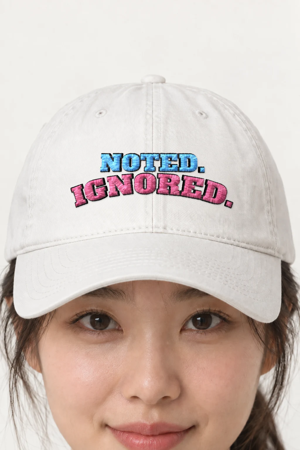 "Noted. Ignored." Classic Dad Hat · Embroidered | Yupoong 6245CM