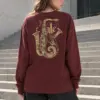 "Ornate Jazz Saxophones" Unisex Longsleeve T-shirt | Gildan 2400