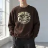 "Own The Chaos" Heavy Blend Unisex Crewneck Sweatshirt | Gildan 18000