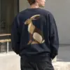 "Patchwork Hare" Heavy Blend Unisex Crewneck Sweatshirt | Gildan 18000