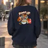 "Power Up Tiger" Heavy Blend Unisex Crewneck Sweatshirt | Gildan 18000