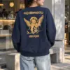 "Praying Baby Angel" Heavy Blend Unisex Crewneck Sweatshirt | Gildan 18000