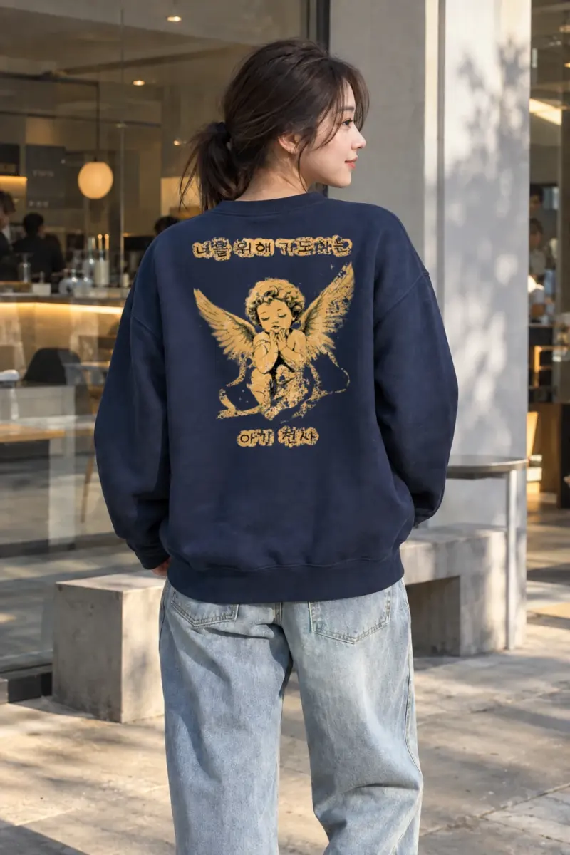 “Praying Baby Angel” Heavy Blend Unisex Crewneck Sweatshirt | Gildan 18000