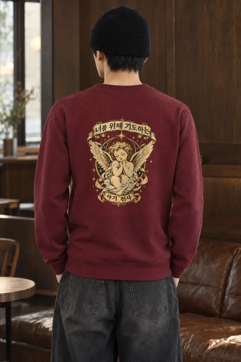 "Praying Baby Angel" Heavy Blend Unisex Crewneck Sweatshirt