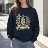 "Quiet Laurel Crest" Heavy Blend Unisex Crewneck Sweatshirt | Gildan 18000