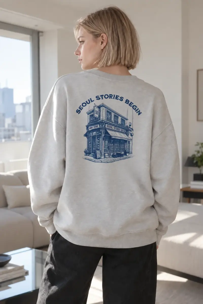 “Seoul Stories Begin” Heavy Blend Unisex Crewneck Sweatshirt | Gildan 18000