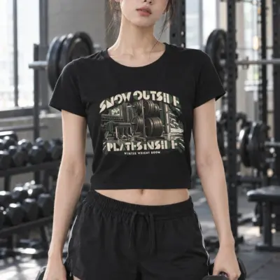 "Snow Outside Plates Inside Winter Weight Room" Women's Crop Tee