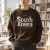 "South Korea Collegiate" Heavy Blend Unisex Crewneck Sweatshirt | Gildan 18000