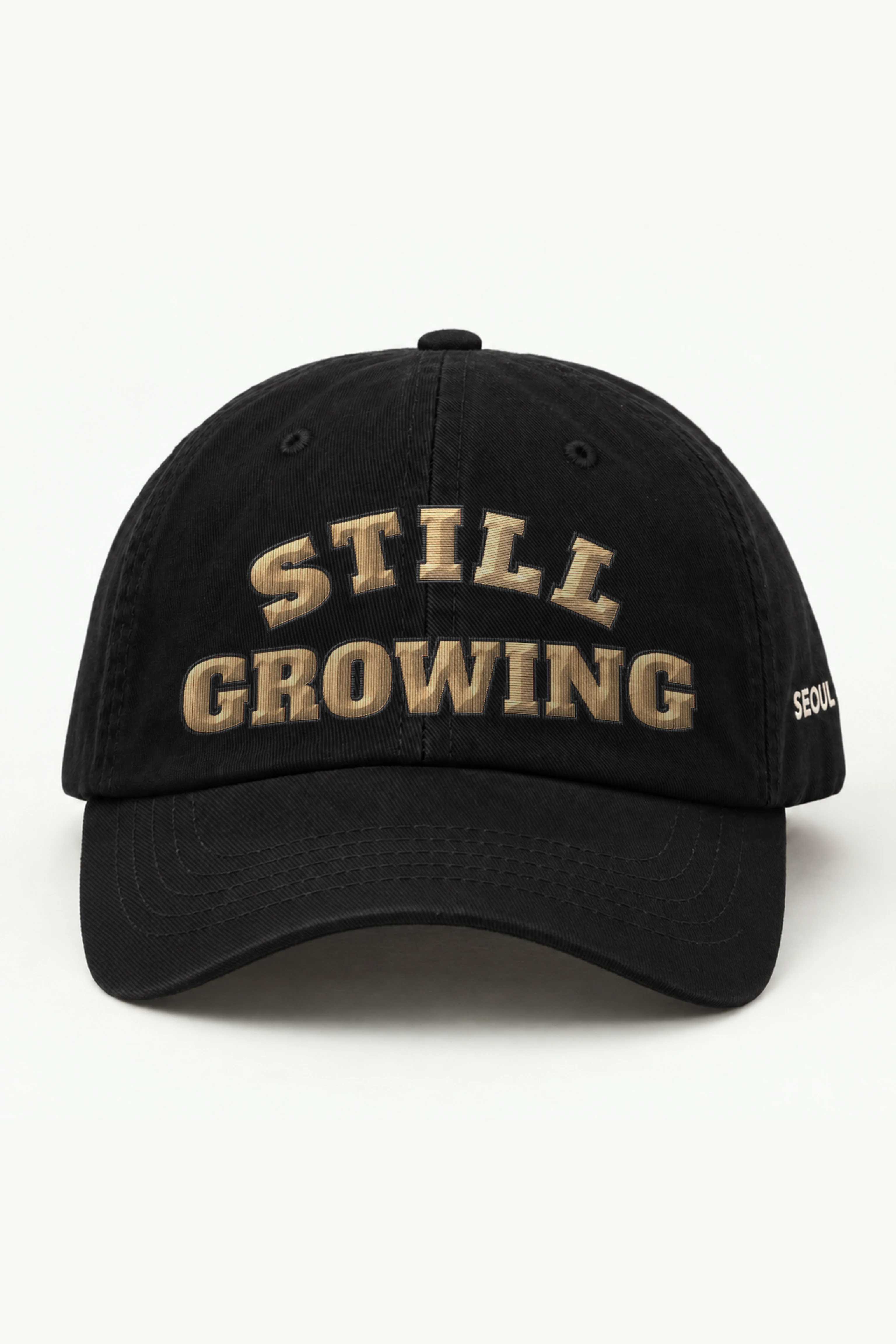 "Still Growing" Classic Dad Hat · Embroidered — black/cap-front