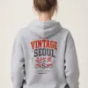 "Timeless Heritage Crest" Heavy Blend Unisex Pullover Hoodie