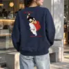 "Woman On A Swing" Heavy Blend Unisex Crewneck Sweatshirt | Gildan 18000