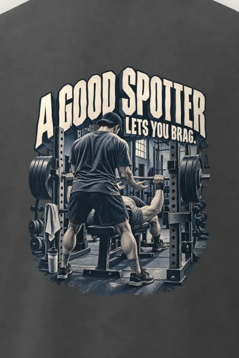 "A Good Spotter Lets You Brag" Men’s Oversized Heavyweight Crewneck T-Shirt - the graphic up close