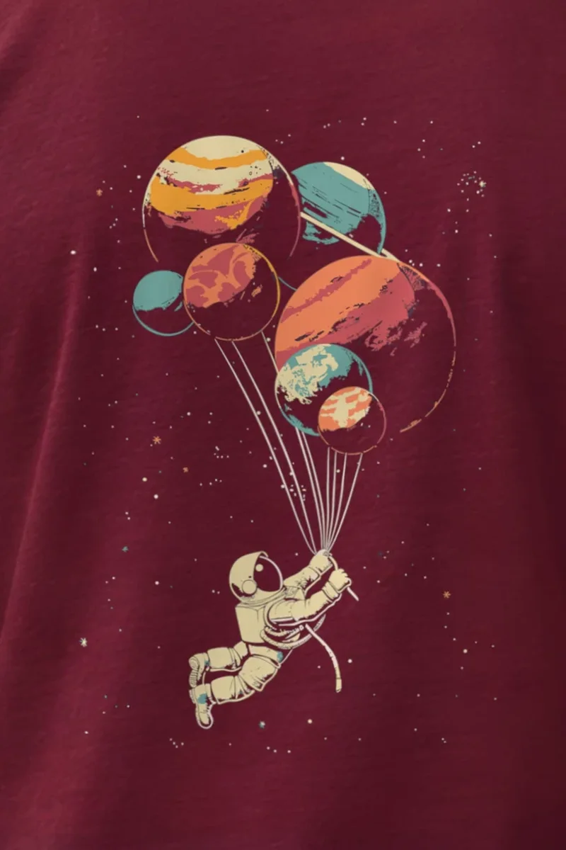 "Balloon Planet Drift" Heavyweight Unisex Crewneck T-shirt - the graphic up close