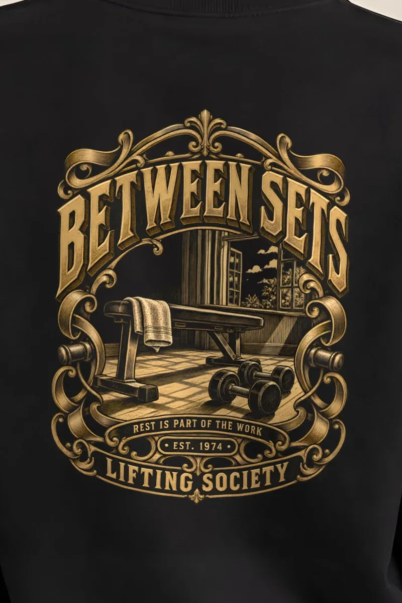 "Between Sets" Heavy Blend Unisex Crewneck Sweatshirt - the graphic up close
