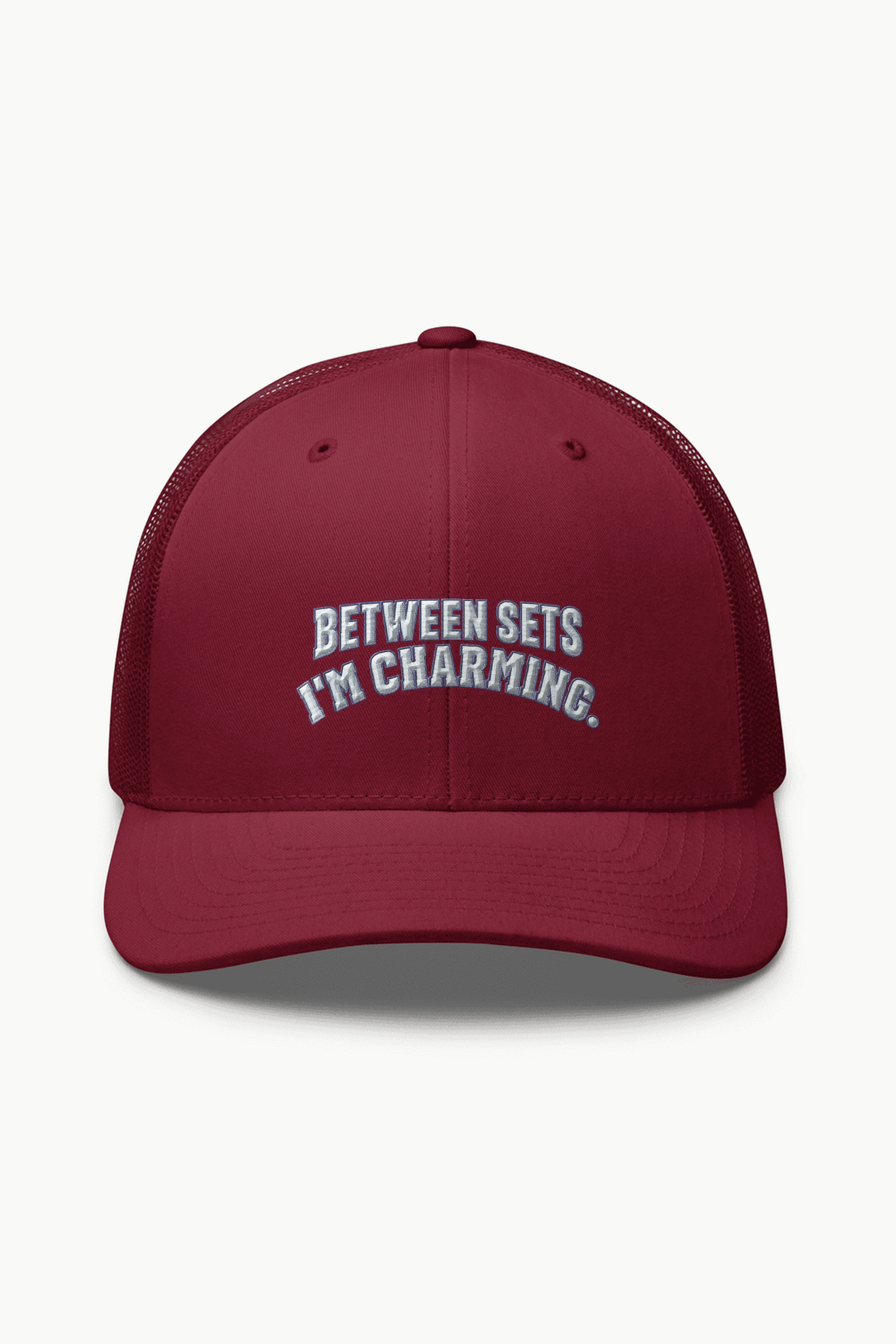"Between Sets I'm Charming" Retro Trucker Cap · Embroidered