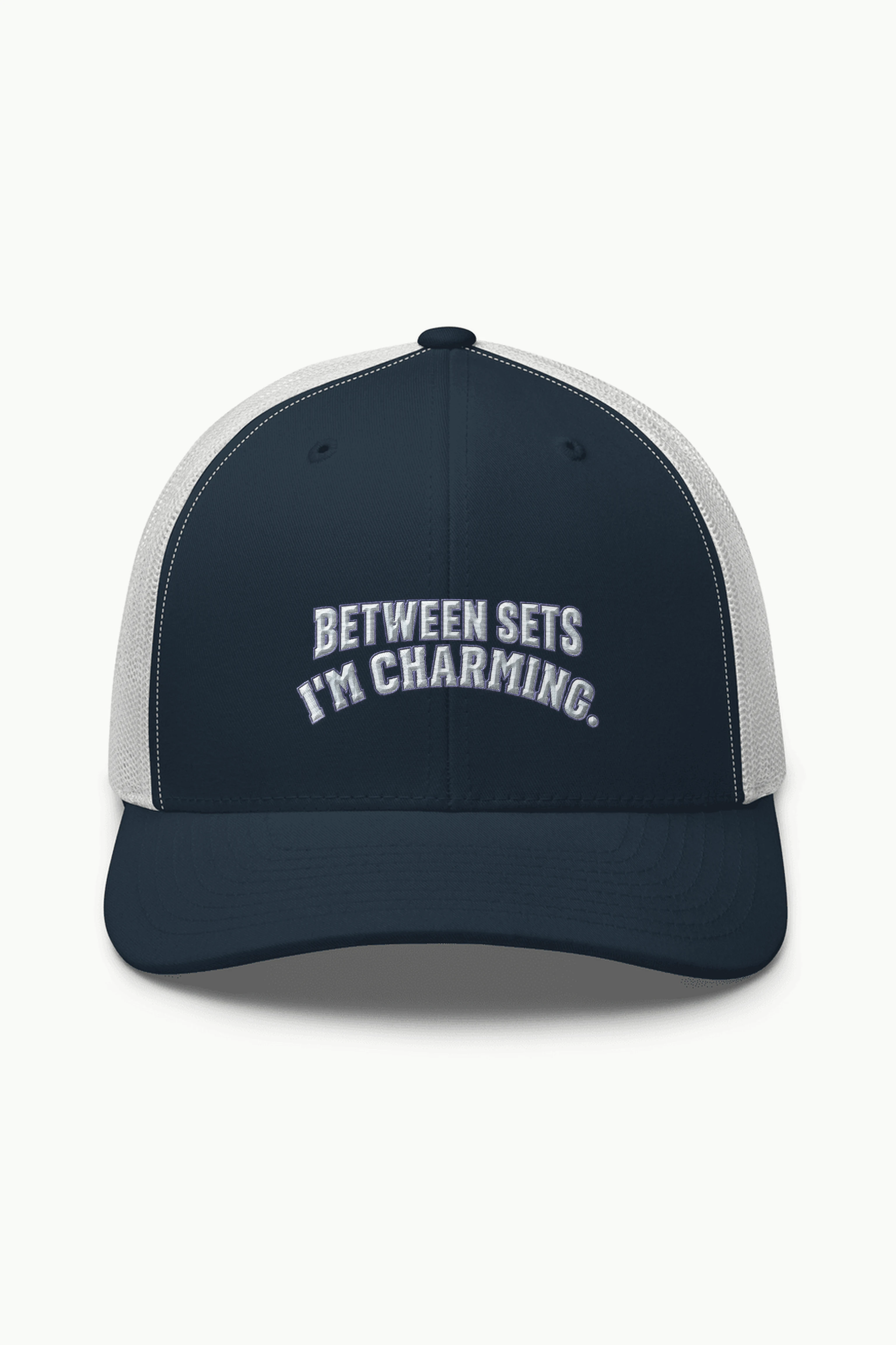 "Between Sets I'm Charming" Retro Trucker Cap · Embroidered