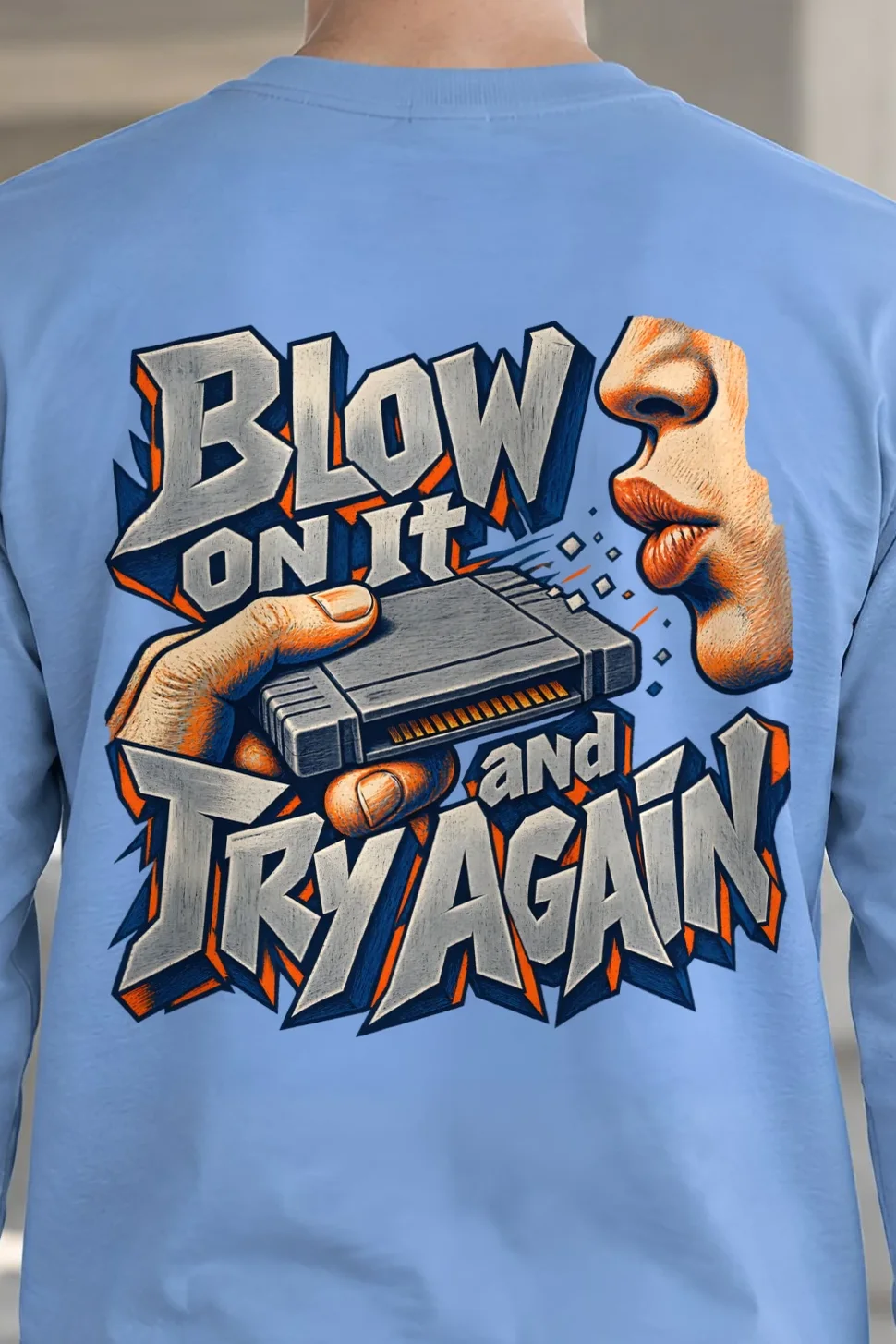 "Blow On It Game Cartridge" Unisex Longsleeve T-shirt - the graphic up close